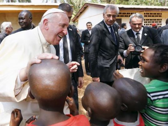 Under tight security, pope urges peace in central Africa