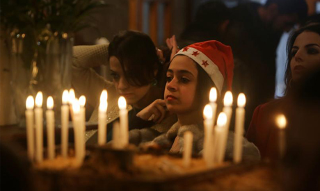Palestinians in a besieged Gaza celebrate Christmas with heavy hearts