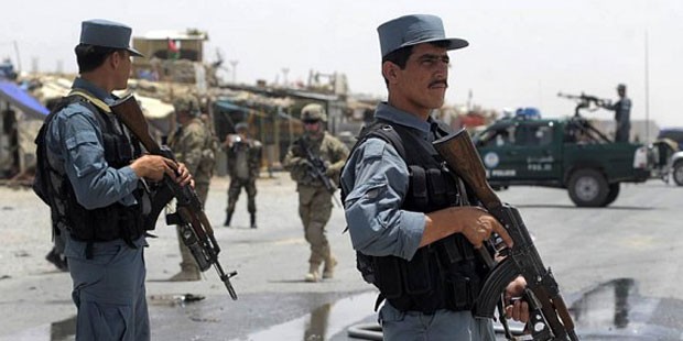 Afghan police officer killed after firing on coalition troops