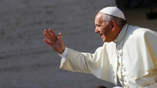 Pope invites refugees to join him on stage for audience