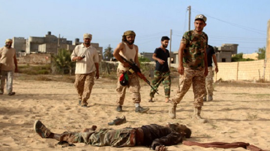 Libya clashes, blast at a depot kill more than 60