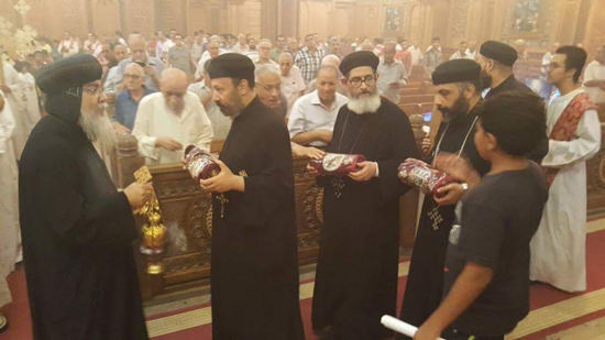 Bishop Makarious perfumes the relics of St. Tadros in Minya