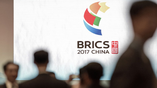 Sisi arrives in China to attend BRICS summit