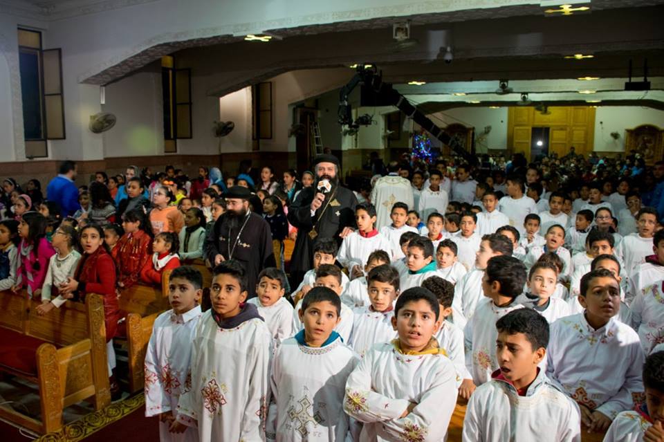 More than a thousand children pray Koiak praise in the Church of St. George in 10th of Ramadan