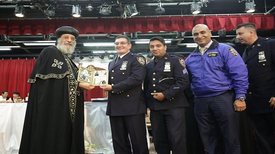 Pope opens a Coptic service center in New York and honors policemen