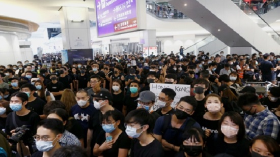 Hong Kong airport halts check-ins as UN urges restraint over protests