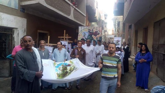 Copts in Minya celebrate St. George s feast  by a street procession