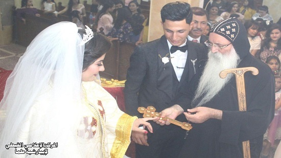 Bishop Isaac presides over a wedding ceremony in St. Yessi monastery