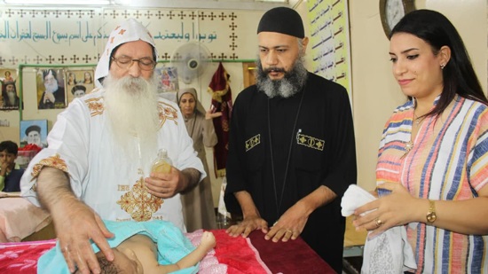 Bishop Isaac presides baptizes two children in St. Yassa monastery
