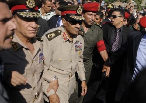 Egypt's PM Unveils New Cabinet, Retaining Tantawi