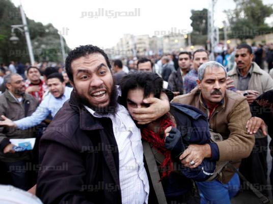 4 arrested after attack on protesters outside Ettehadiya Palace