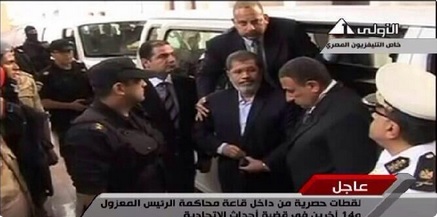 Egyptian TV broadcast footages of Morsy's trial